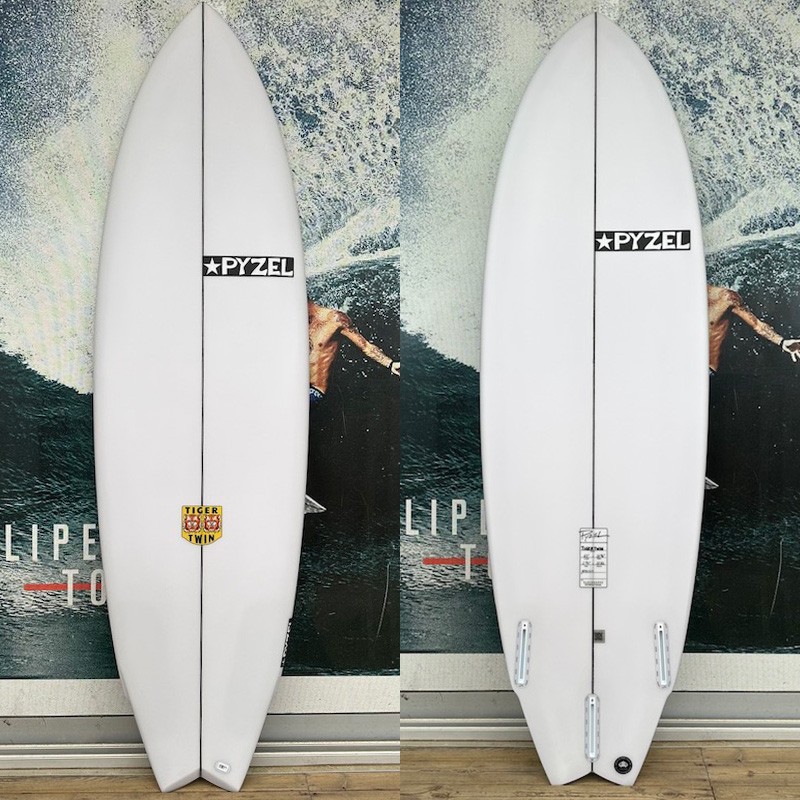 Planche de surf Pyzel Tiger Twin 6'0, configuration deux dérives + trailer, outline performance.